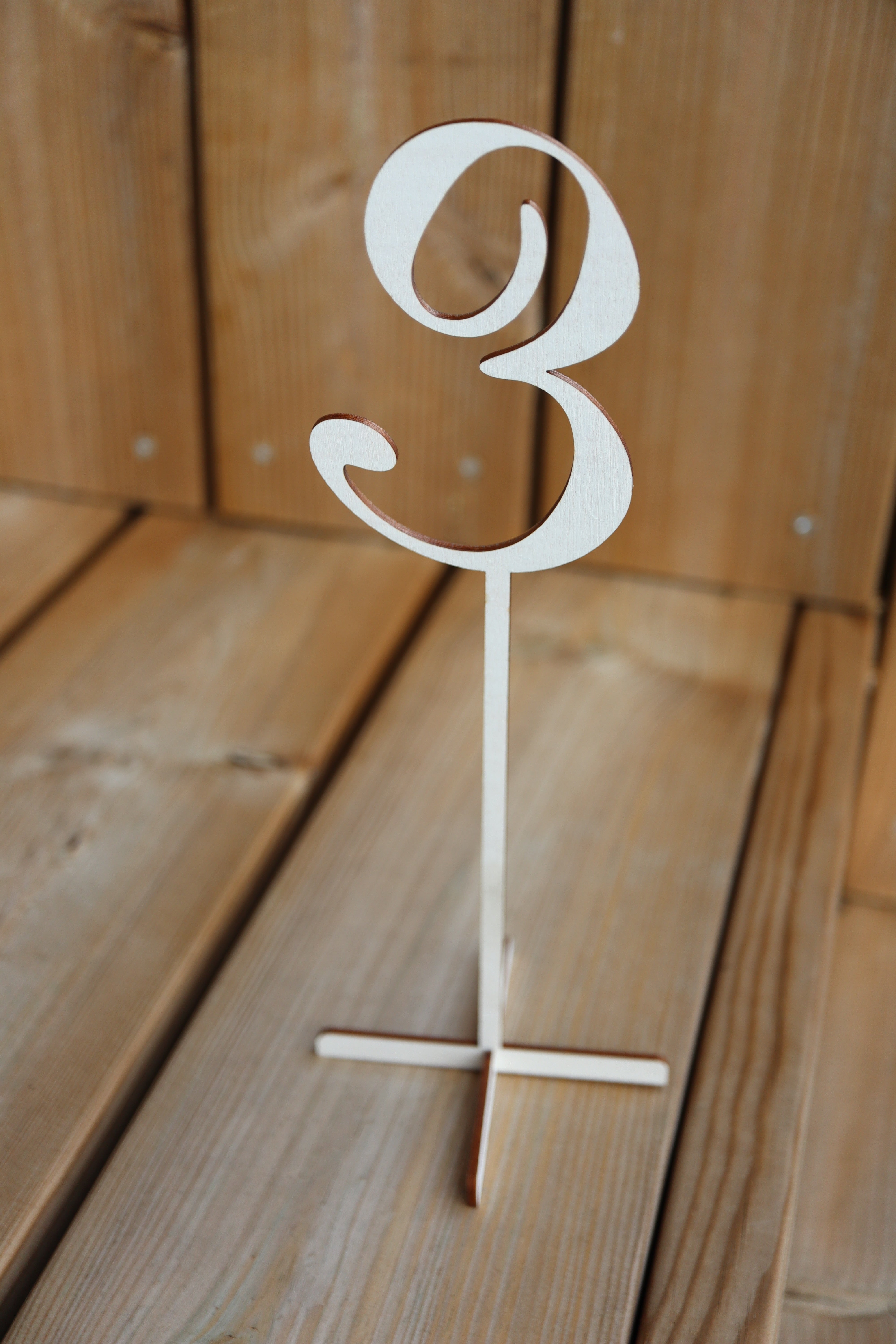 Wooden table numbers 1-15 with legs or sticks